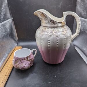 Elegant Pink and White Ceramic Pitcher and Cup Set